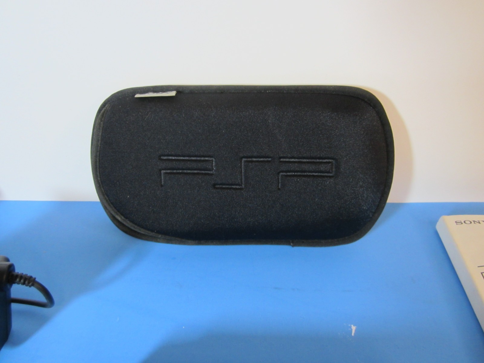SONY PSP-1001 Black Console Bundle 7-Games with manuals & accessories *TESTED*