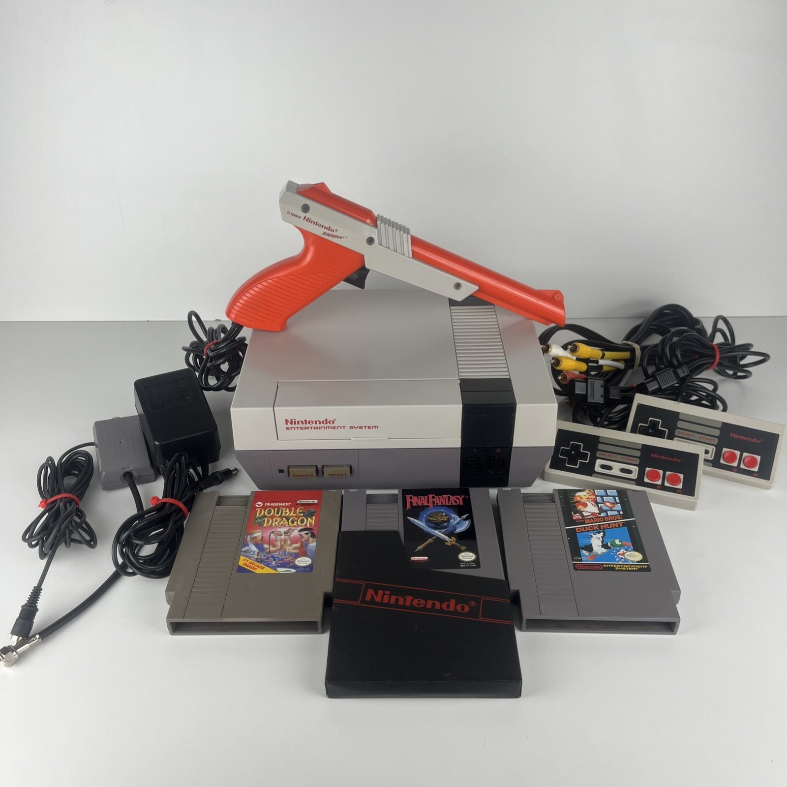 Nintendo NES System Console Bundle 2 Controllers Zapper Gun 3 Games NEW 72 PIN