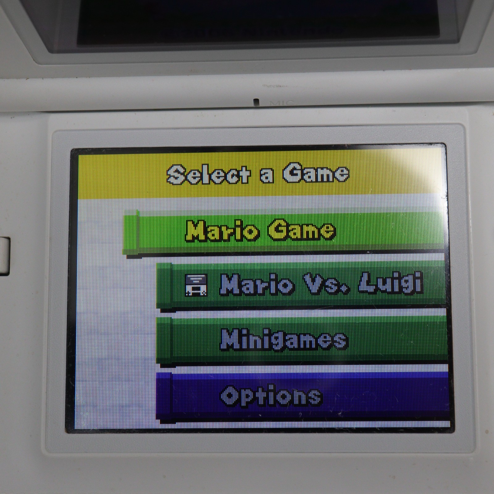 Nintendo DS Lite (USG-001) Handheld with 6 Games & Carrying Pouch – Polar White