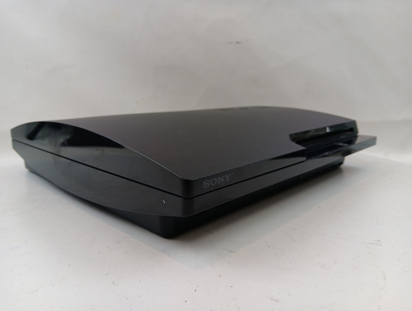 Sony PS3 Slim 250GB Console Bundle W/ Wireless Controller & 8 Games Tested Works