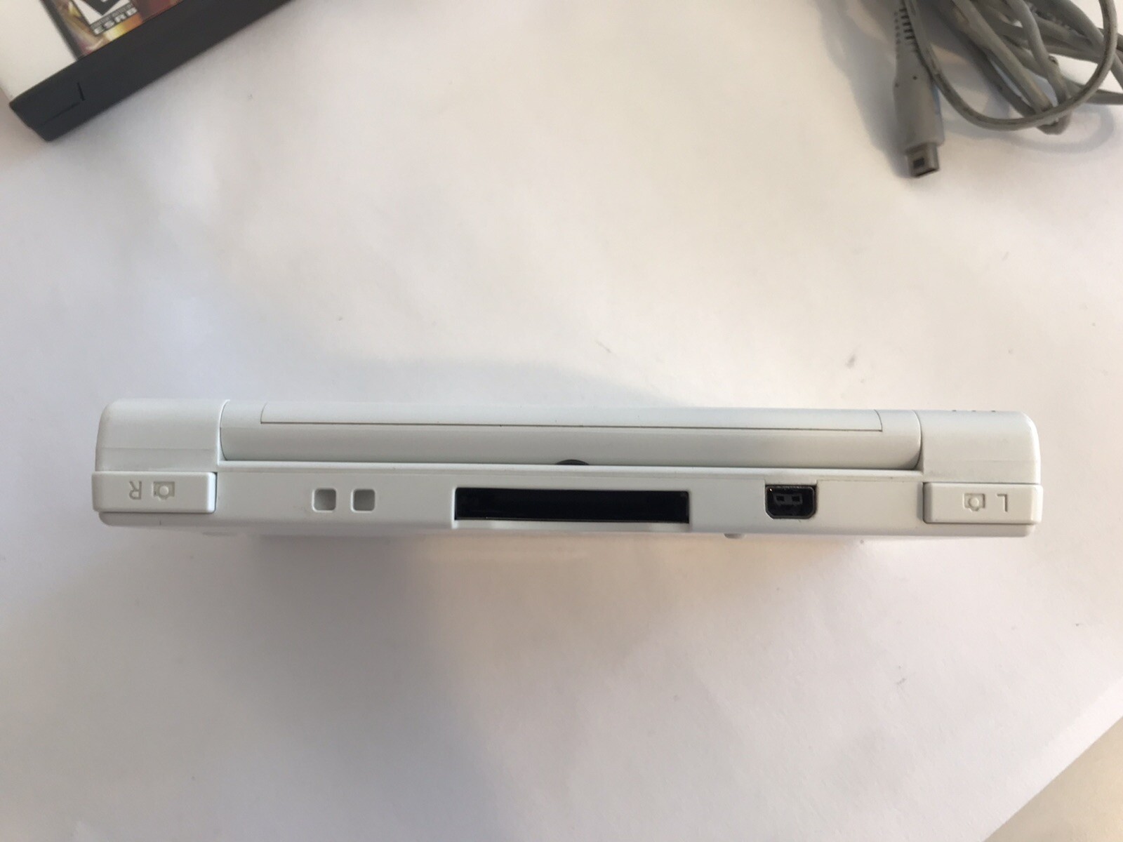 Nintendo DSi Handheld Game Console – White- with charger and 8 games