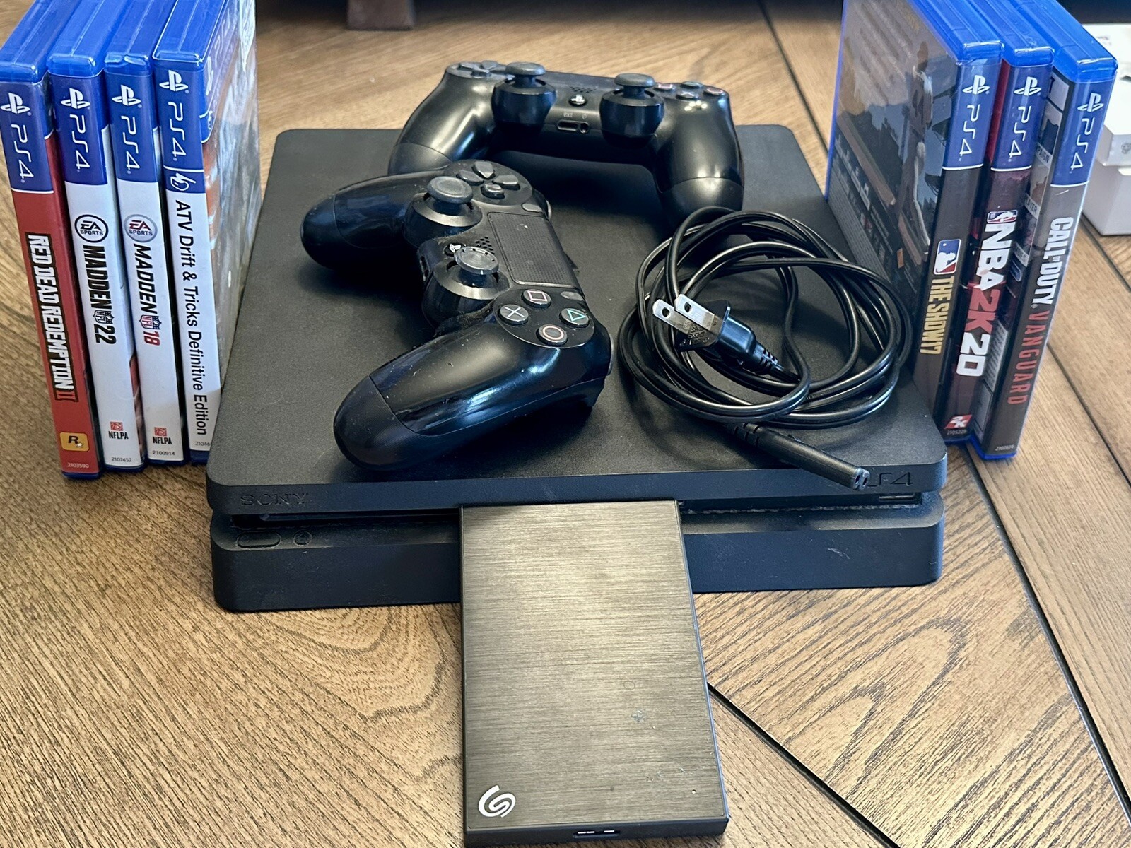 Sony PlayStation 4 Slim 500GB Console – 2 Controllers, 1 TB Seagate HD, Games