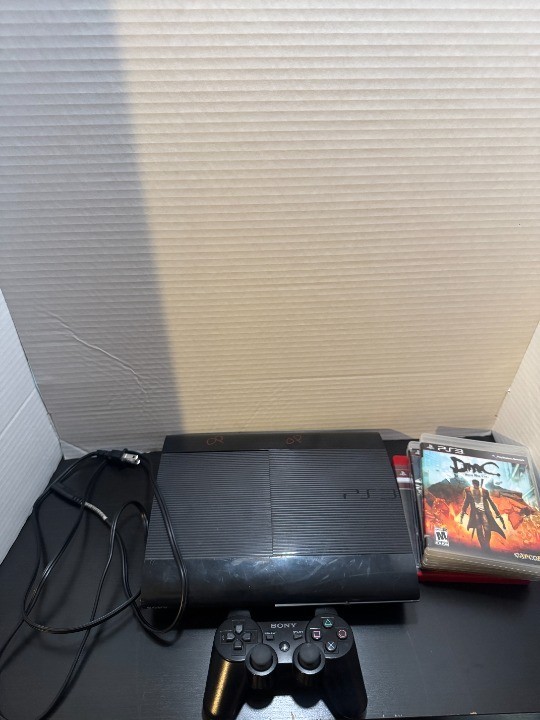 Sony PS3 Super Slim Console 500GB w/ Controller + 4 Games Last of Us Mortal Komb