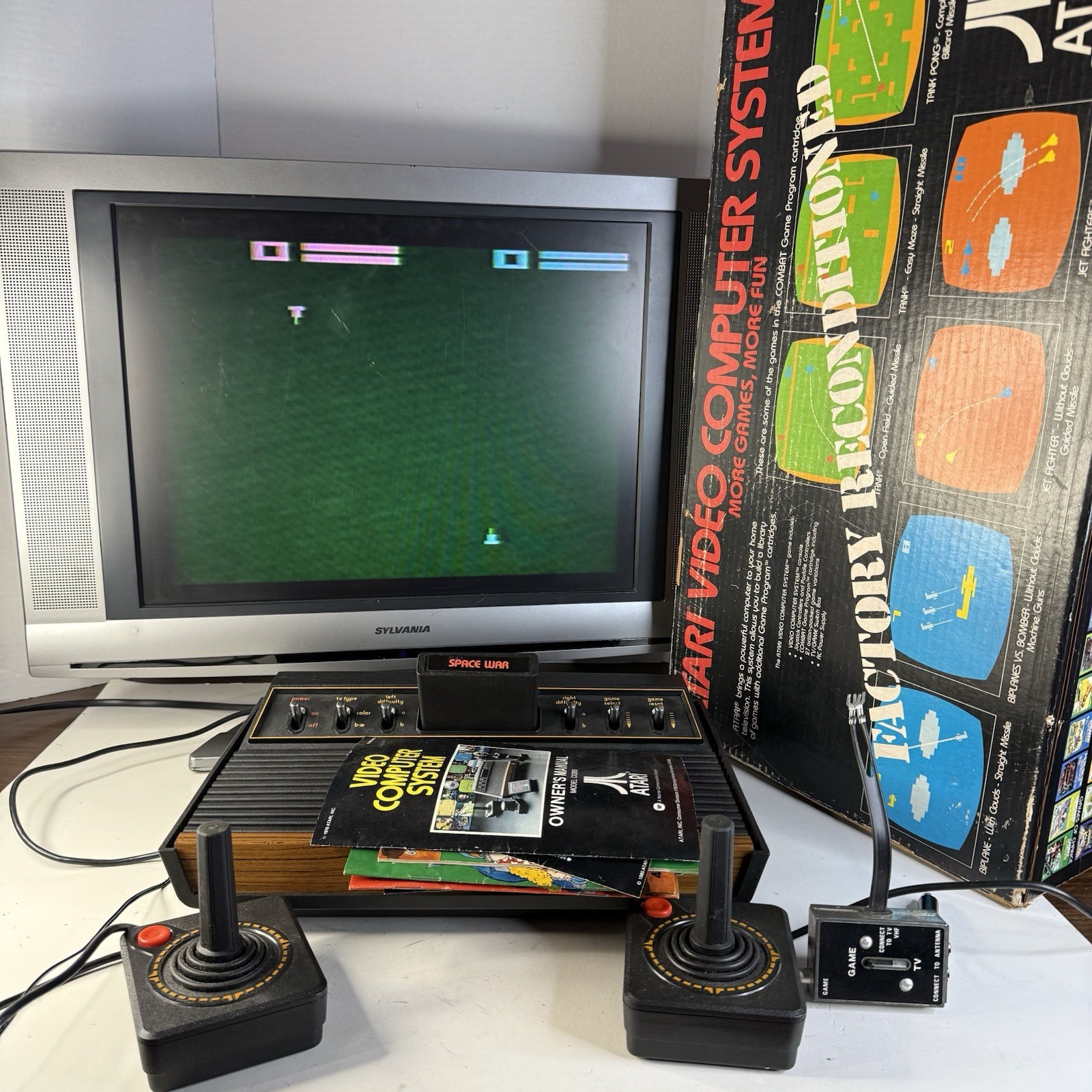 ATARI CX-2600 Video Computer System Factory Reconditioned Box + 2 remotes WORKS!
