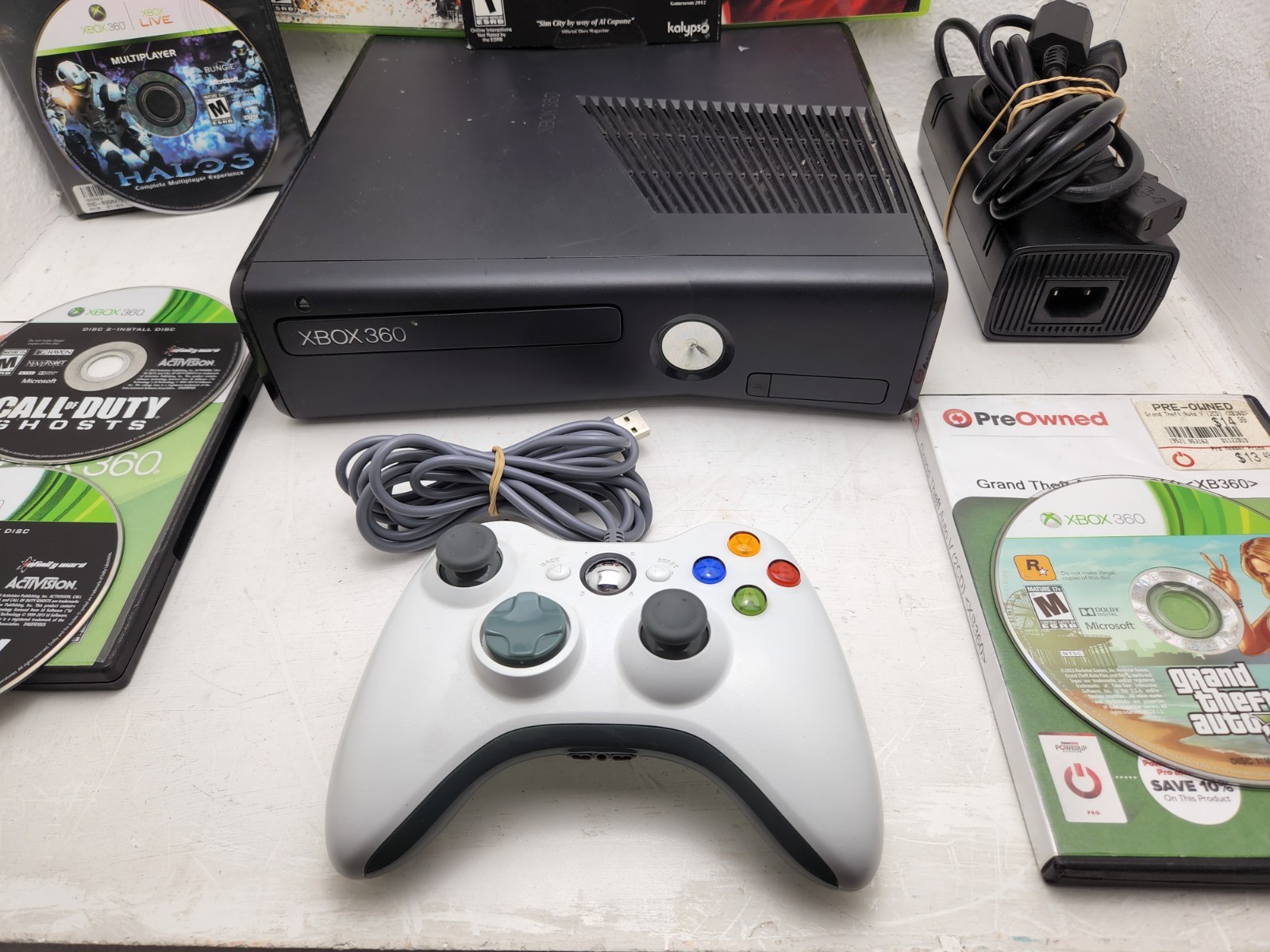 Microsoft xbox 360 slim console bundle w/ 6 games – Fully Tested