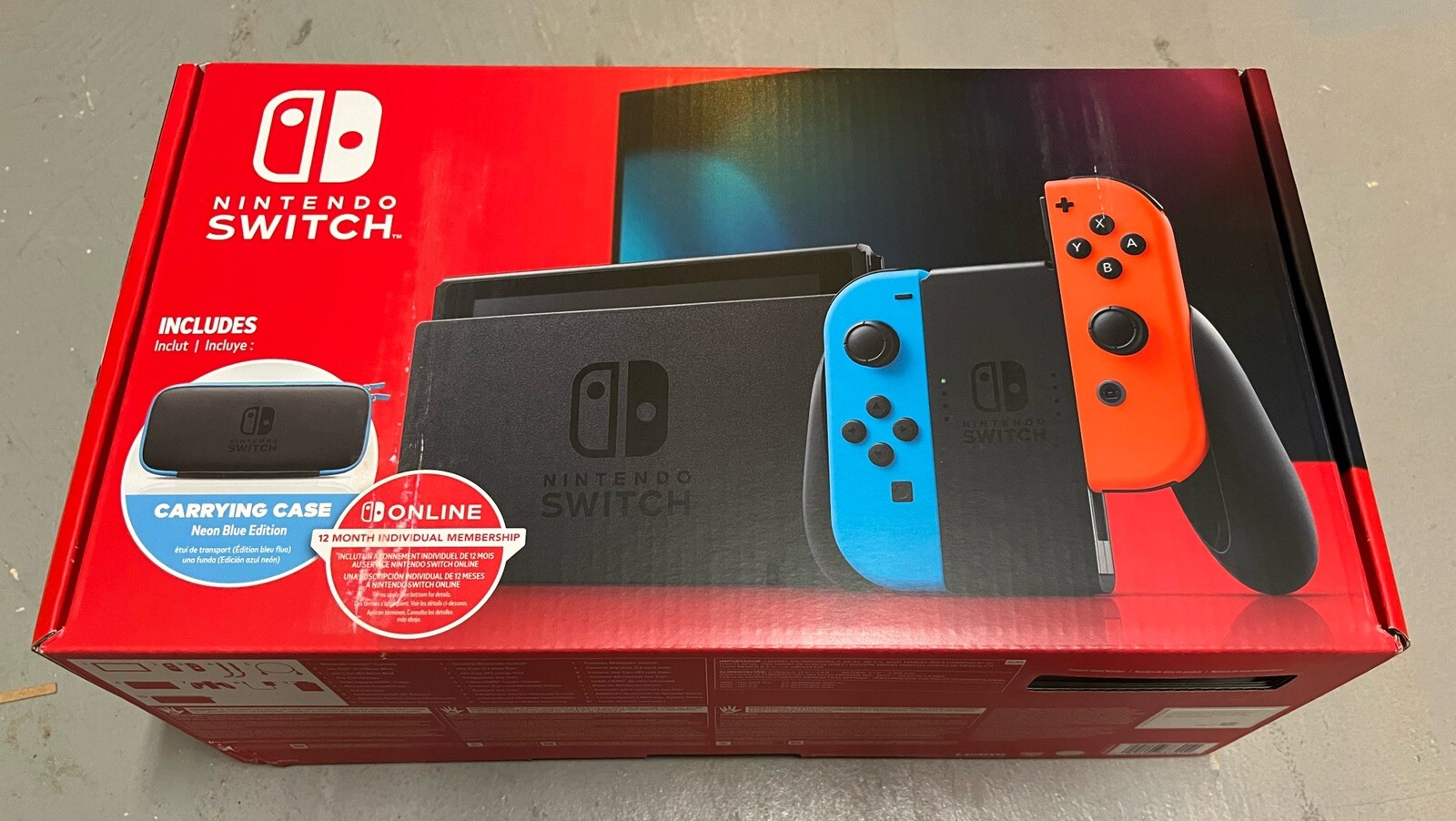 Nintendo Switch Blue/Red Handheld Console w/Case & 12 Month Online Membership