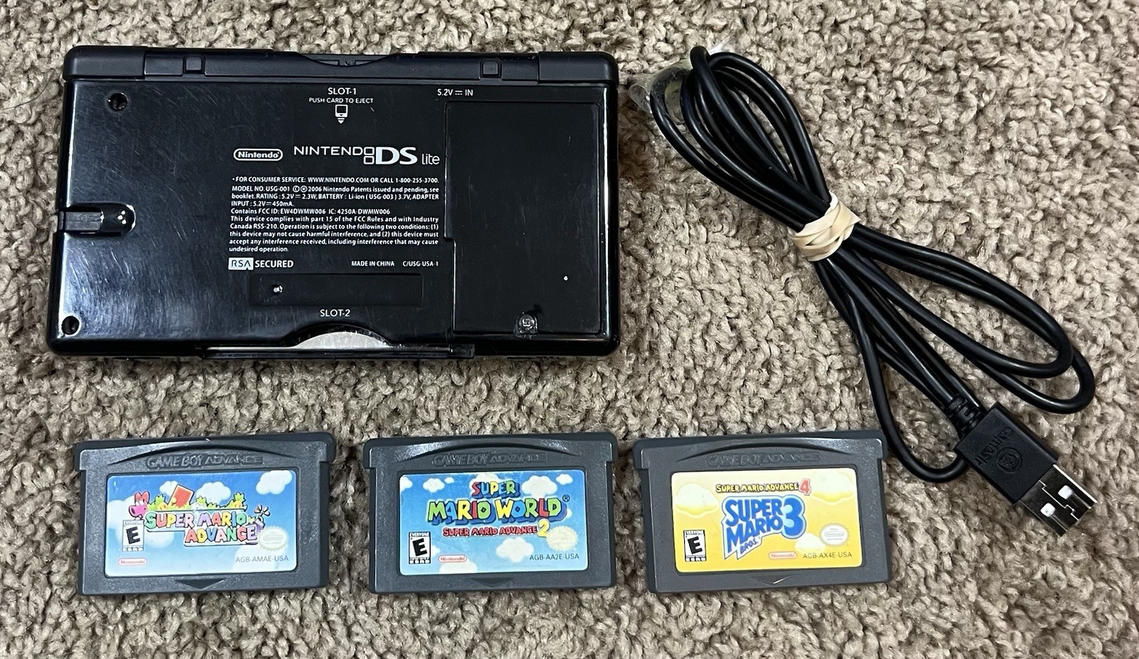 Nintendo DS Lite Bundle With 3 Games Super Mario Advance 1, 2, & 3
