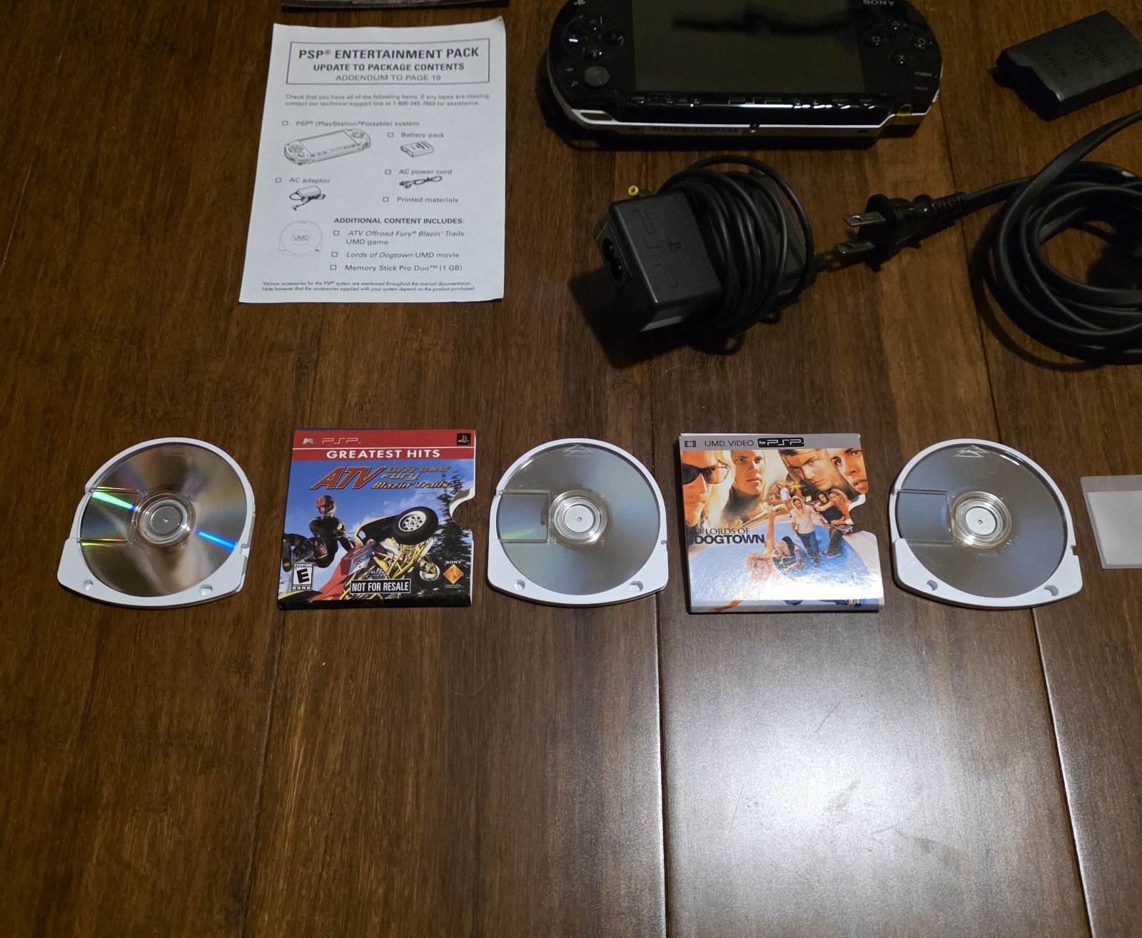 Sony PSP 1001 Piano Black Bundle With Games And Original Card Insert – Pre-Owned