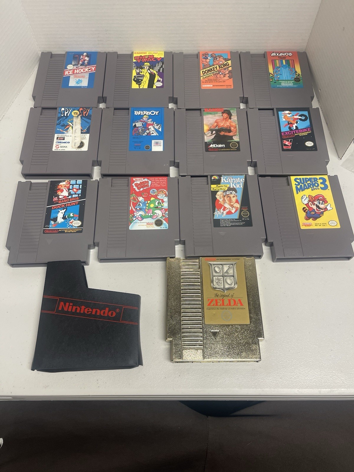 Original Nintendo NES bundle with cords, 2 controllers, zapper, and 17 games
