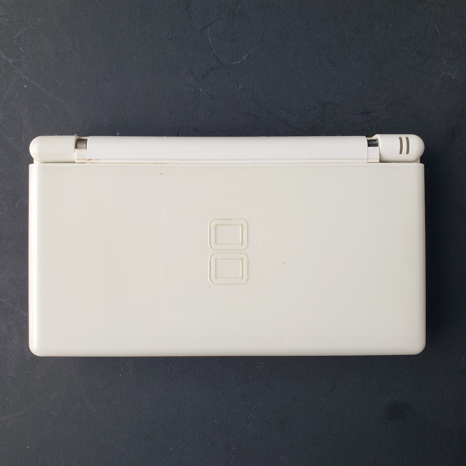 Nintendo DS Lite USG-001 Polar White Handheld w/ Charger 3 Games & Mini Backpack
