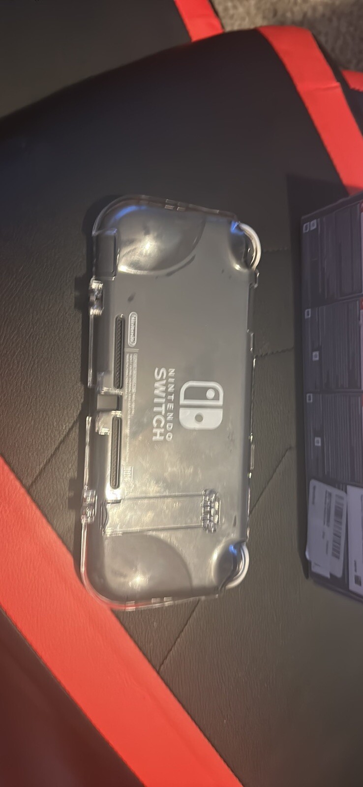 Nintendo Switch Lite Gray Handheld System with clear grip case