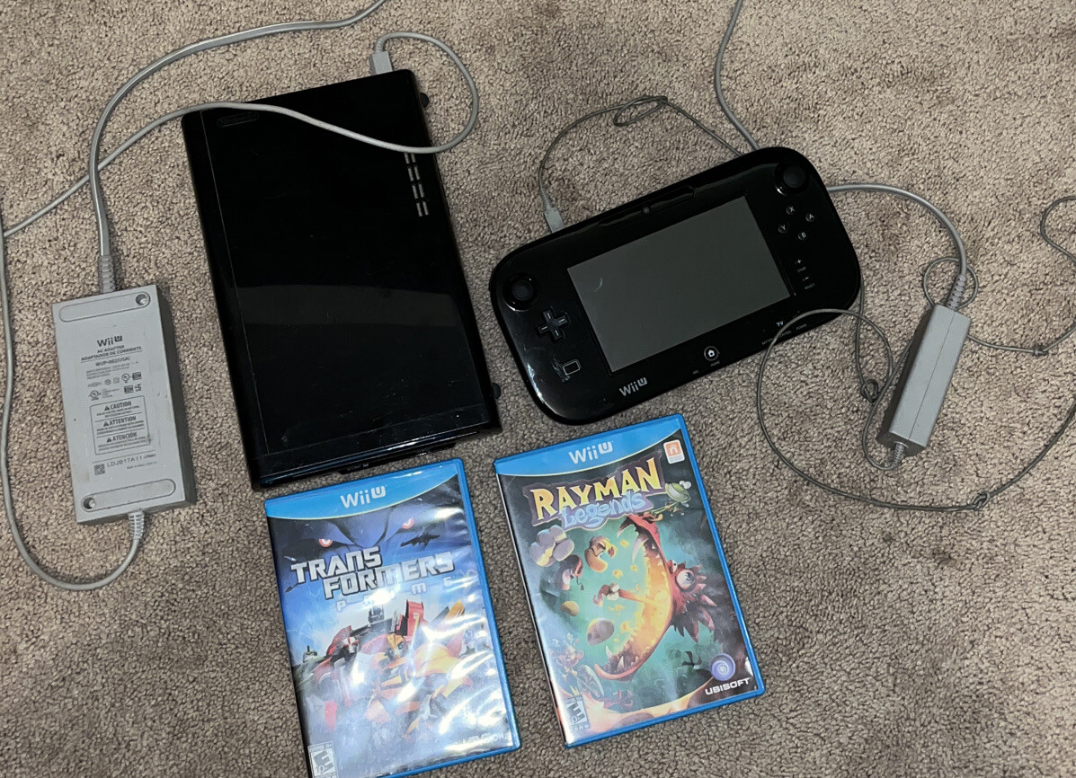 Wii U-32gb. +Rayman Legends,Mario Cart 8, and Transformers prime.