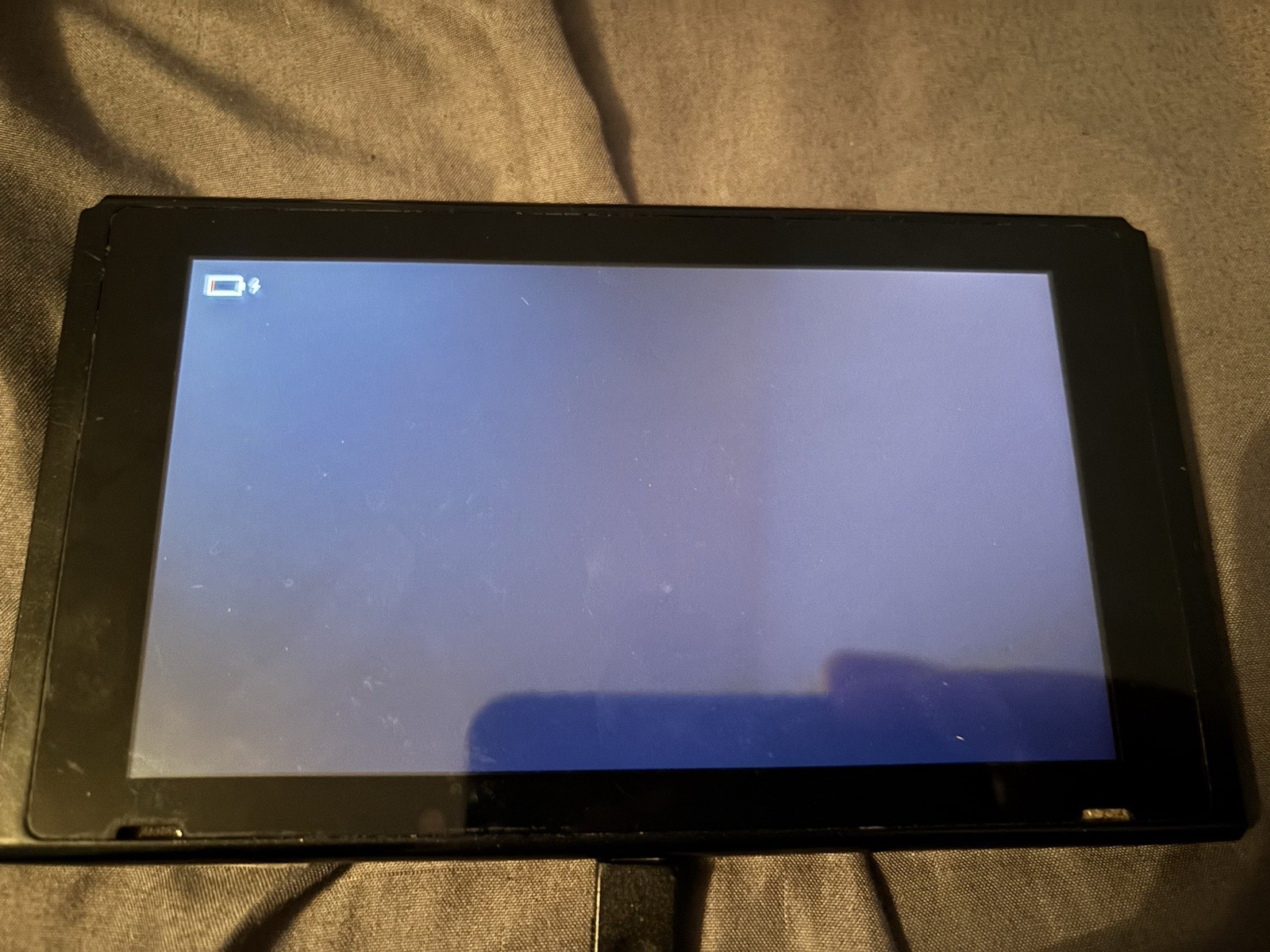 Nintendo Switch, 2 controllers don’t know if they work), bag, and smash bros