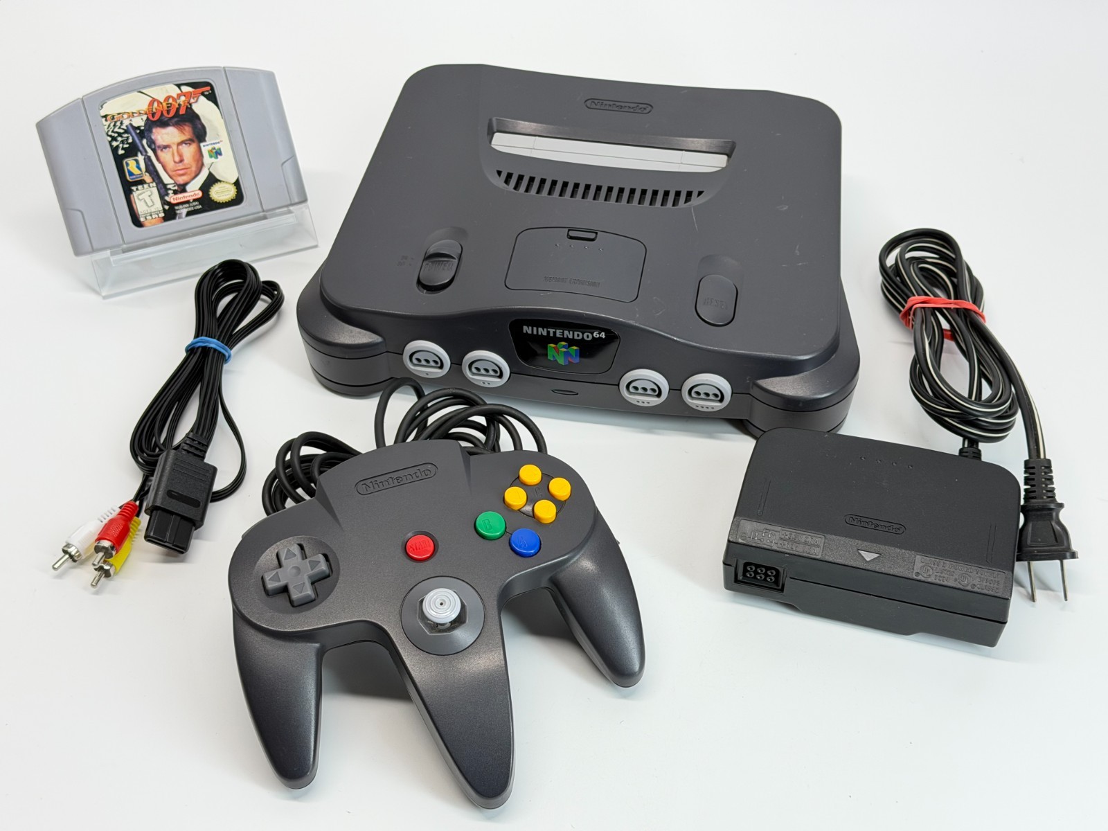 Nintendo N64 System BUNDLE w/ Golden Eye 007 + Black Controller Cords *TESTED*