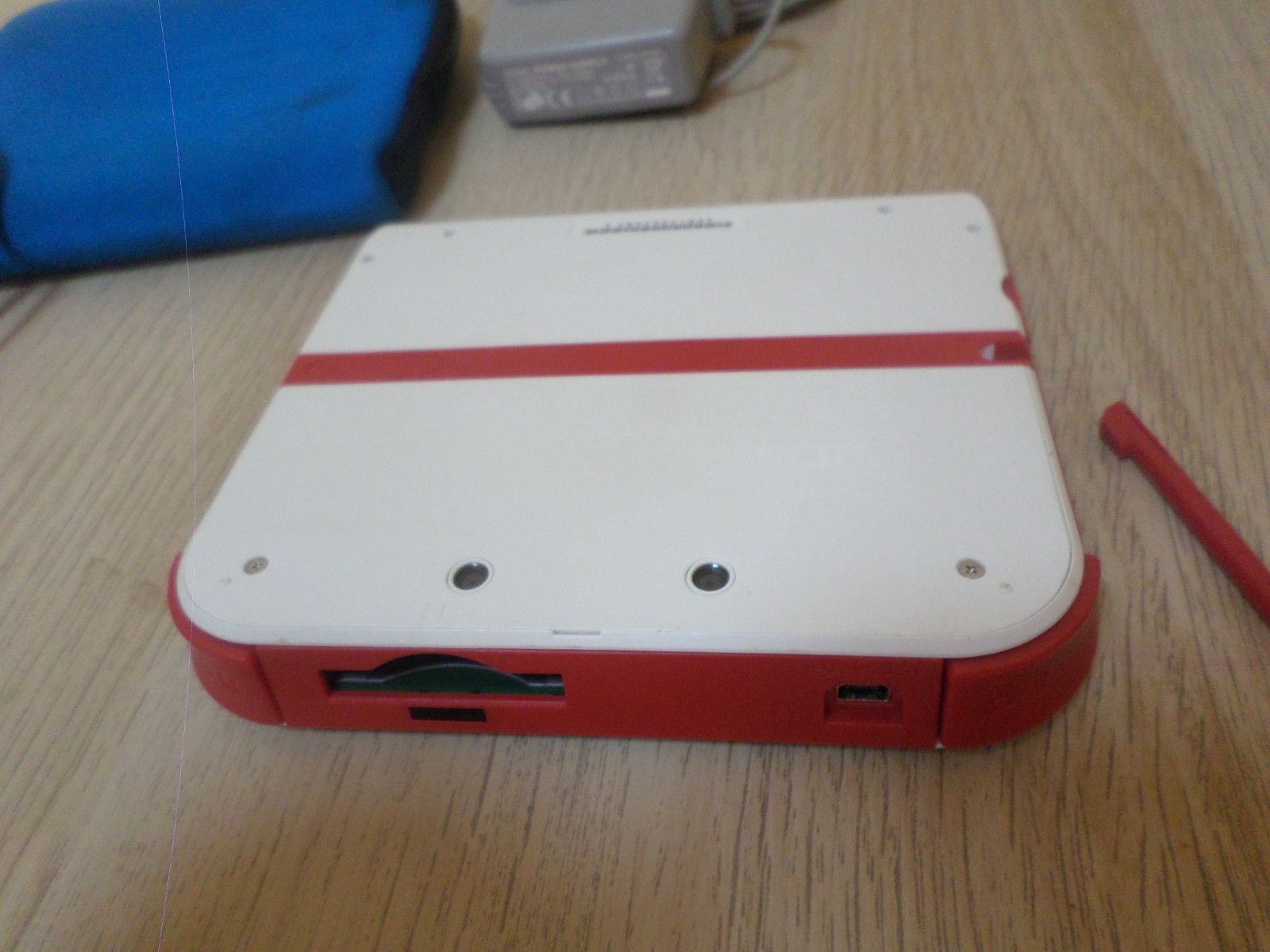 Nintendo 2DS White Red Console Bundle – 4 Games, Charger, Case, Stylus, 4GB SD