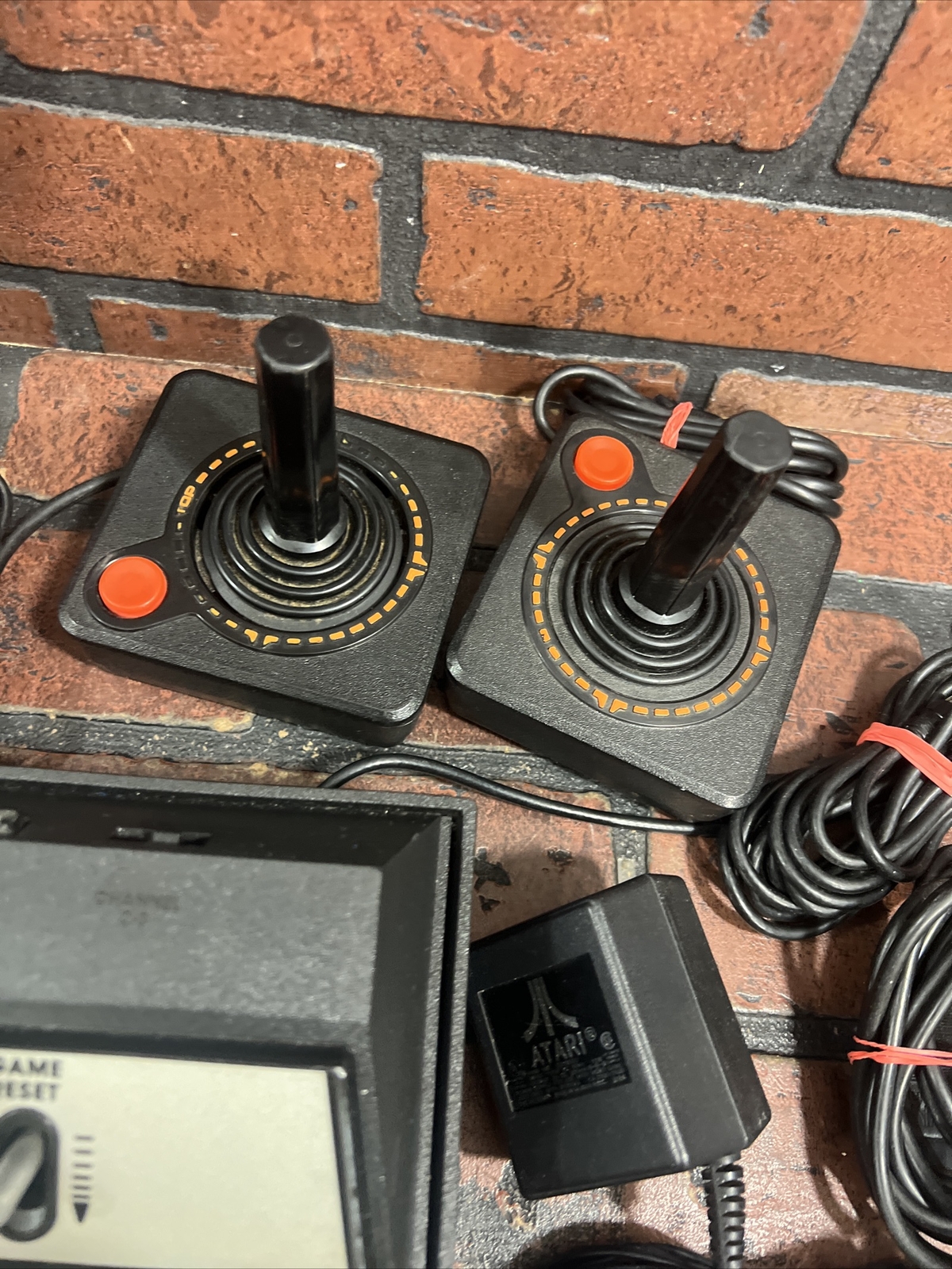 ATARI 2600 4-Switch w/ Power Supply, Joysticks, Paddles, TV Adapter & 7 Games
