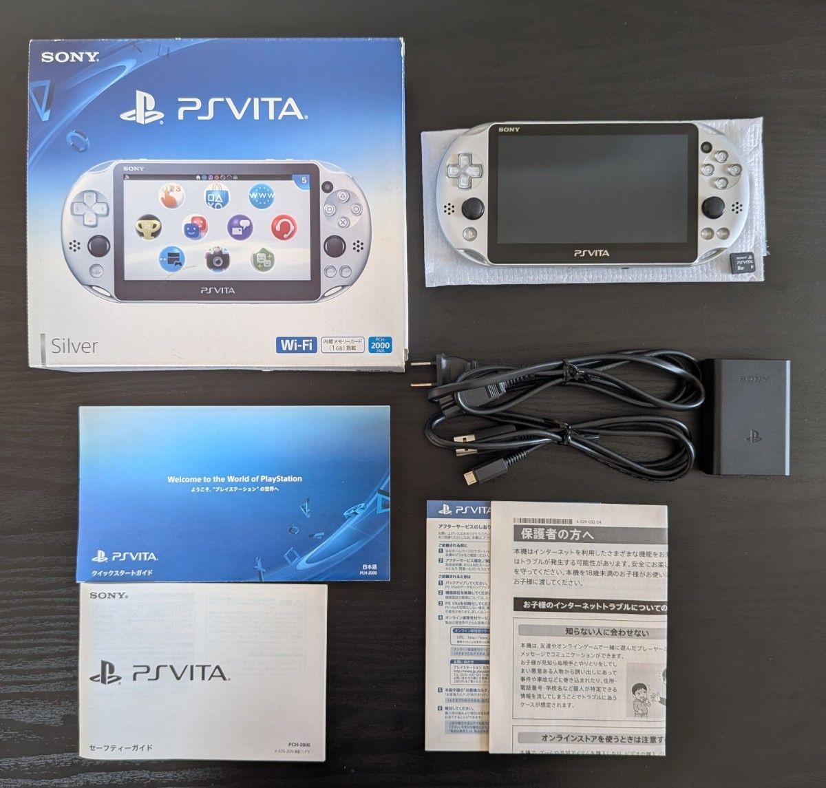Excellent SONY PlayStation PS Vita Wi-Fi PCH-2000 Silver Console Tested