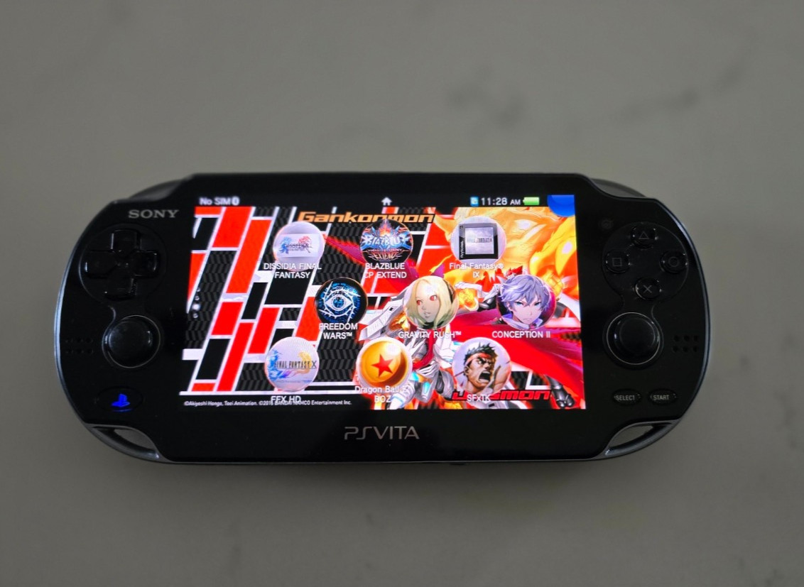 Sony PS Vita PCH-1101 OLED 3G Wi-Fi Handheld Console Black Tested + Charger 32GB