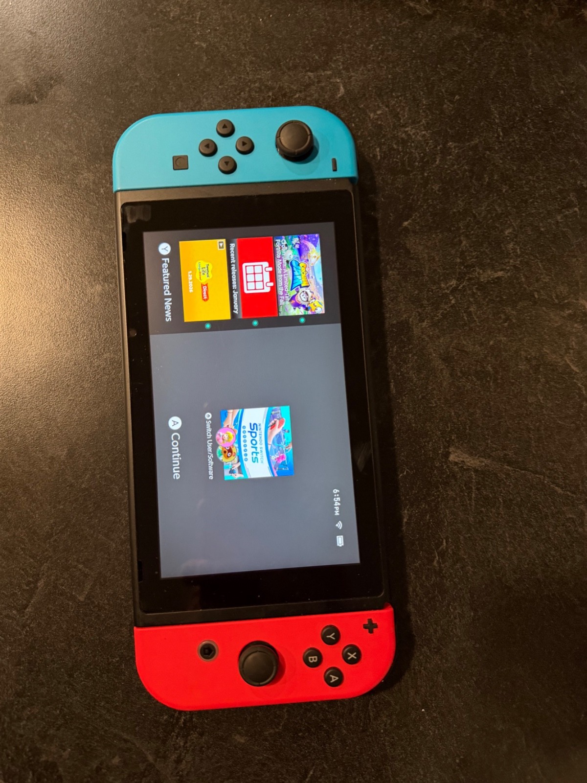 Nintendo Switch Console w Neon blue and red Joy-Con