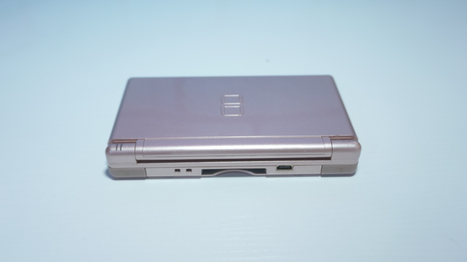 Nintendo DS Lite Metallic Pink Handheld Gaming System with Charger and Stylus