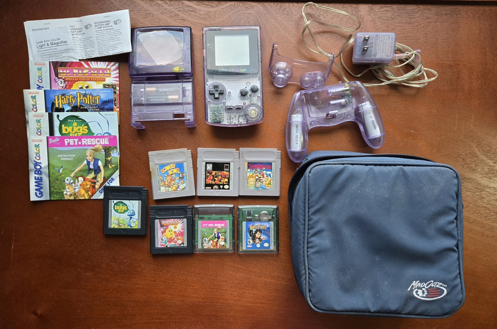 NINTENDO GAMEBOY COLOR Atomic Purple SET w/ 7 Games, 4 accessories and charger