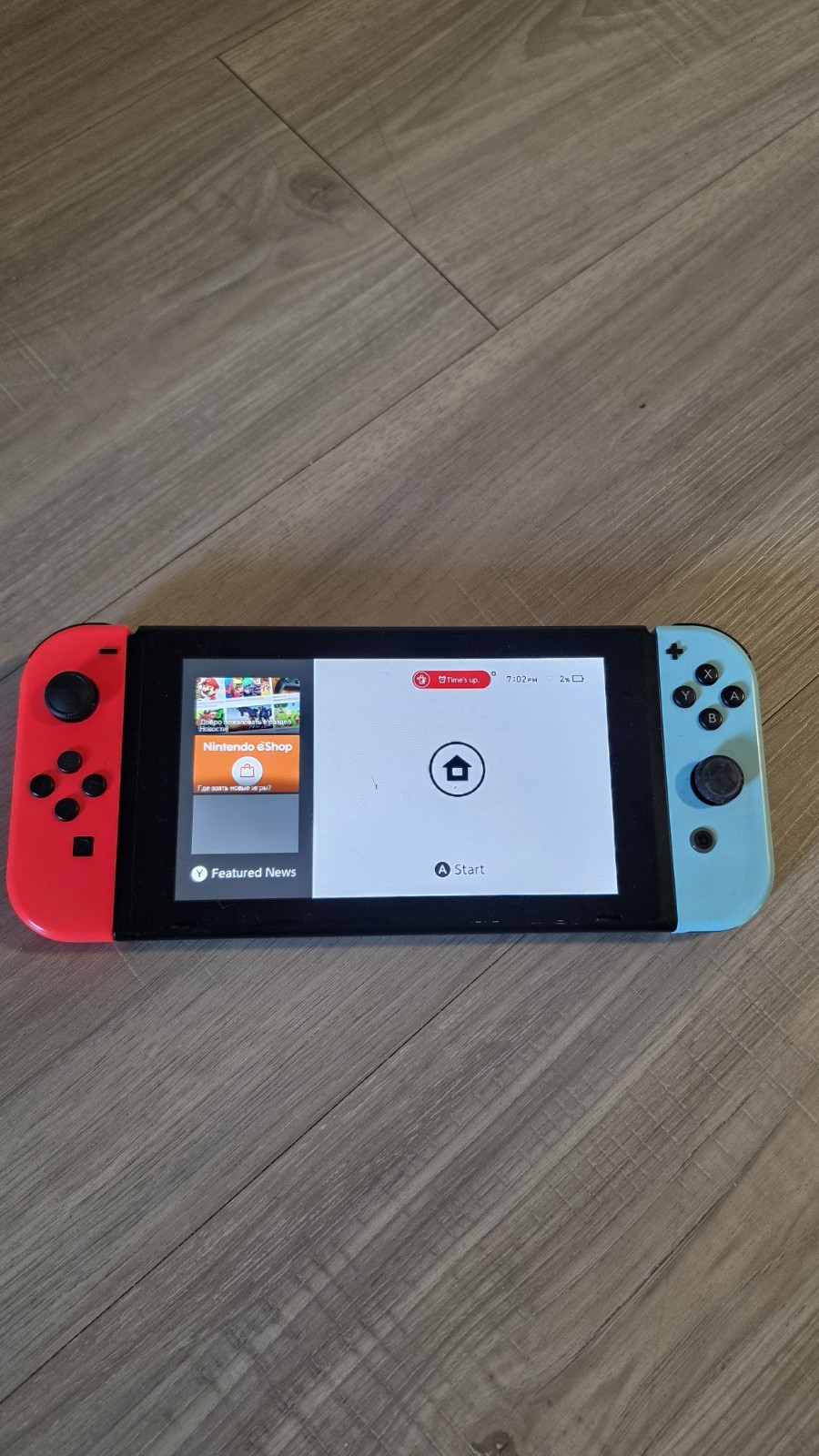 Nintendo Switch with Neon Blue and Red Joy-Con