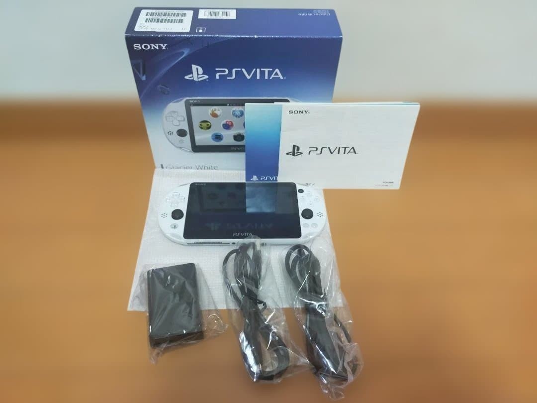 Never Used Sony PS Vita PCH-2000 Handheld Console – Glacier White