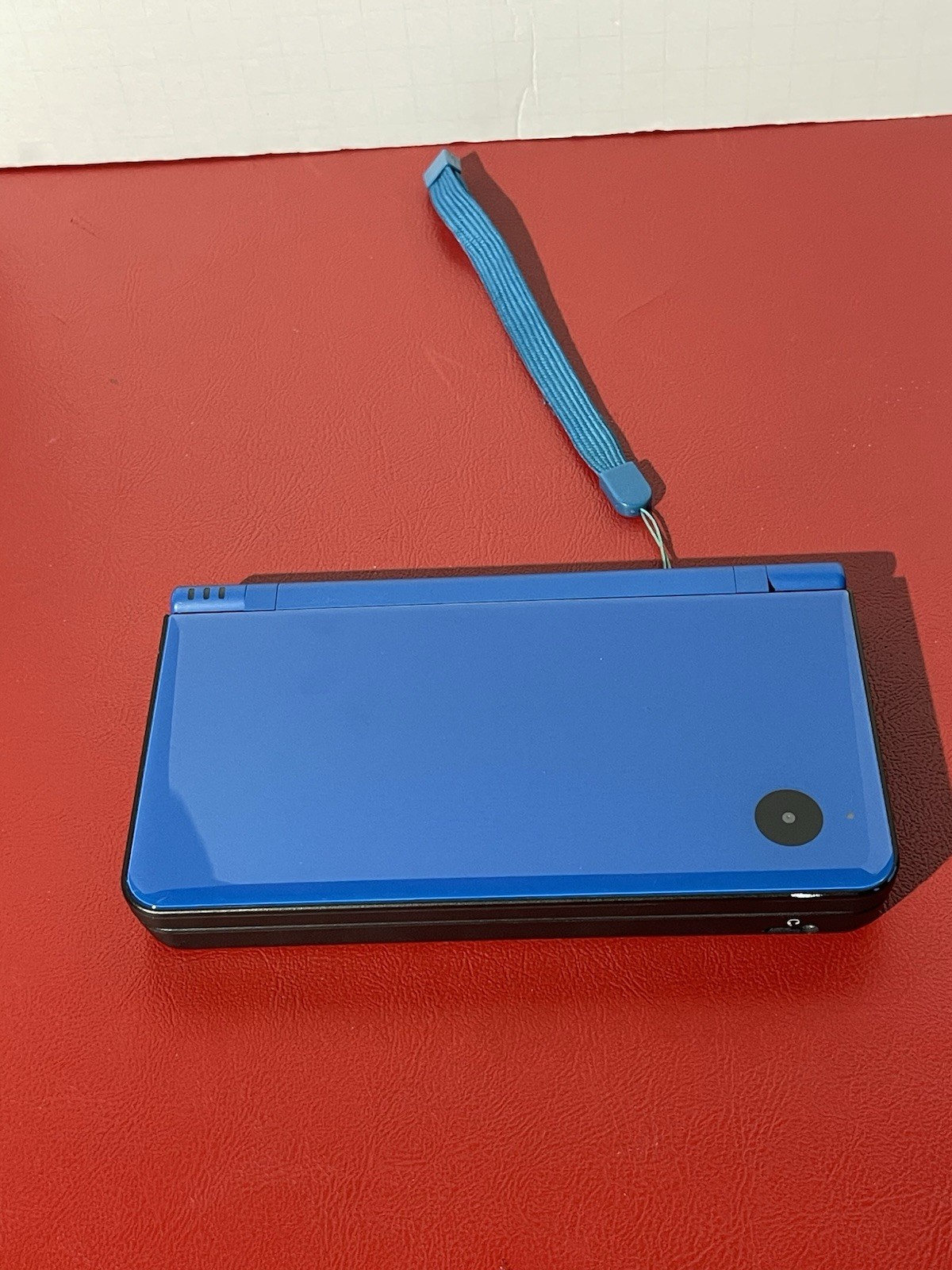 NINTENDO DSI XL BLUE FOR PARTS OR REPAIR NOT WORKING CRACKED SCREEN