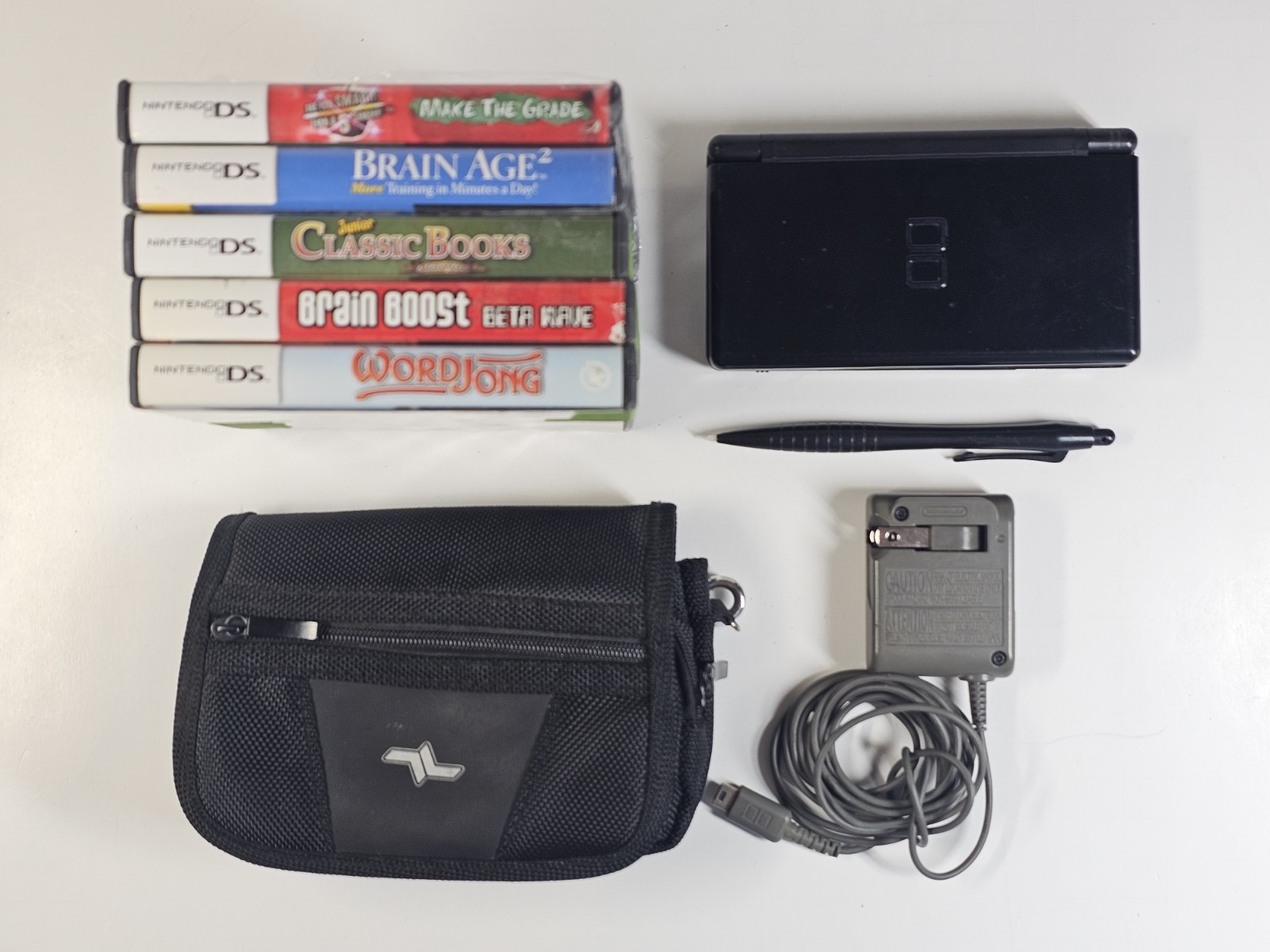 Black Nintendo DS Lite Handheld Bundle, 5 Games, Travel Case & Charger, Tested
