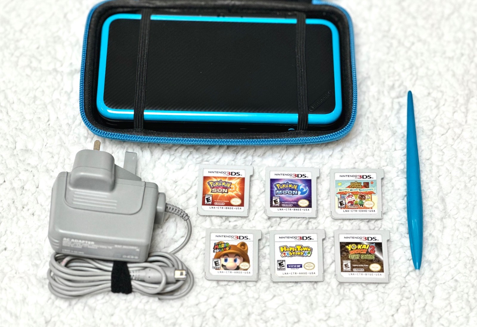 Nintendo 2DS XL Console – (uk) Black/Turquoise and game title (MINT condition)