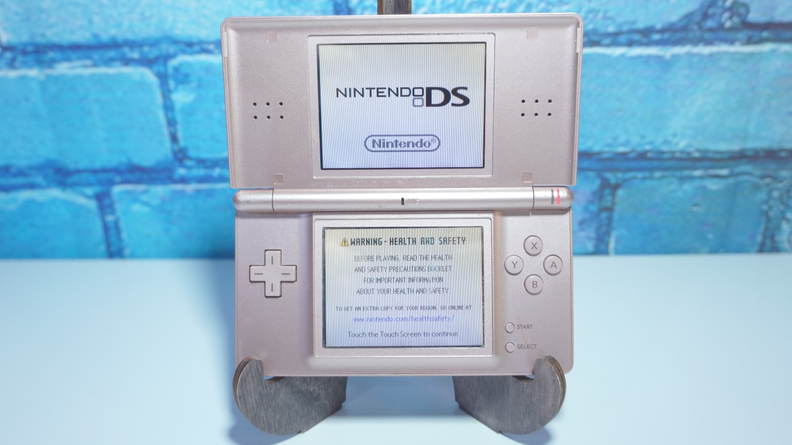 Nintendo DS Lite Metallic Pink Handheld Gaming System with Charger and Stylus