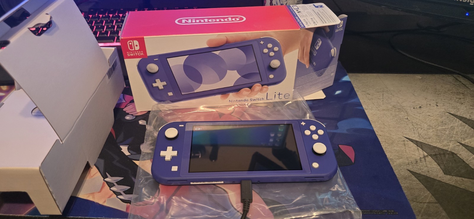 Nintendo Switch Lite Blue Handheld Console with Box and Accessories