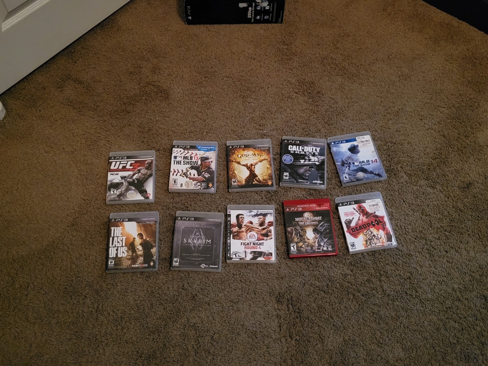 Sony PlayStation 3 Console with 2 Controllers, and 10 games (No HDMI Cable)