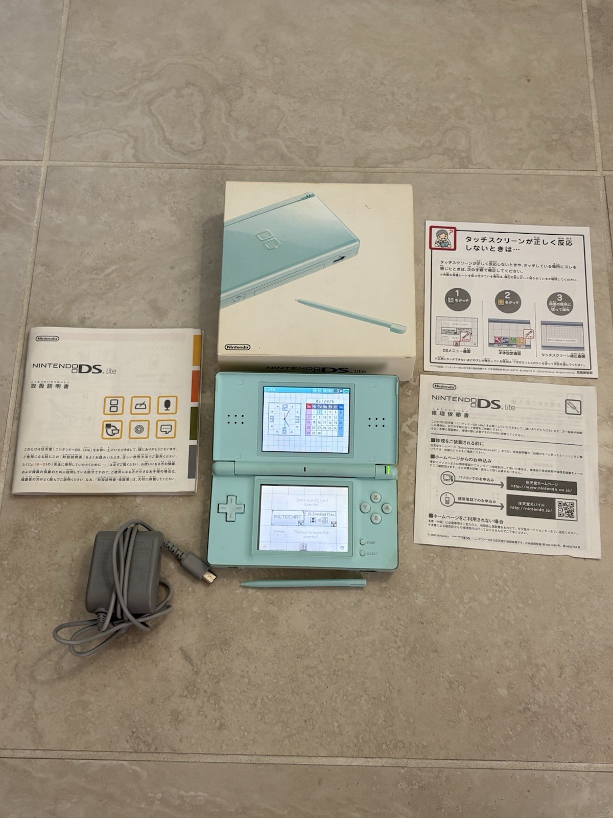 Nintendo DS Lite Ice Blue With Charger And Stylus Complete In Box Excellent