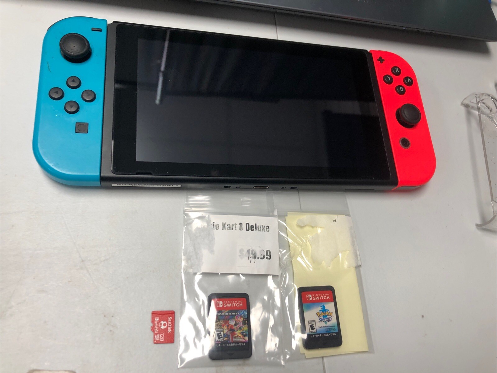 DW Nintendo Switch Console Only Games Bundle Mario Kart 8 & Pokémon Sword + SD