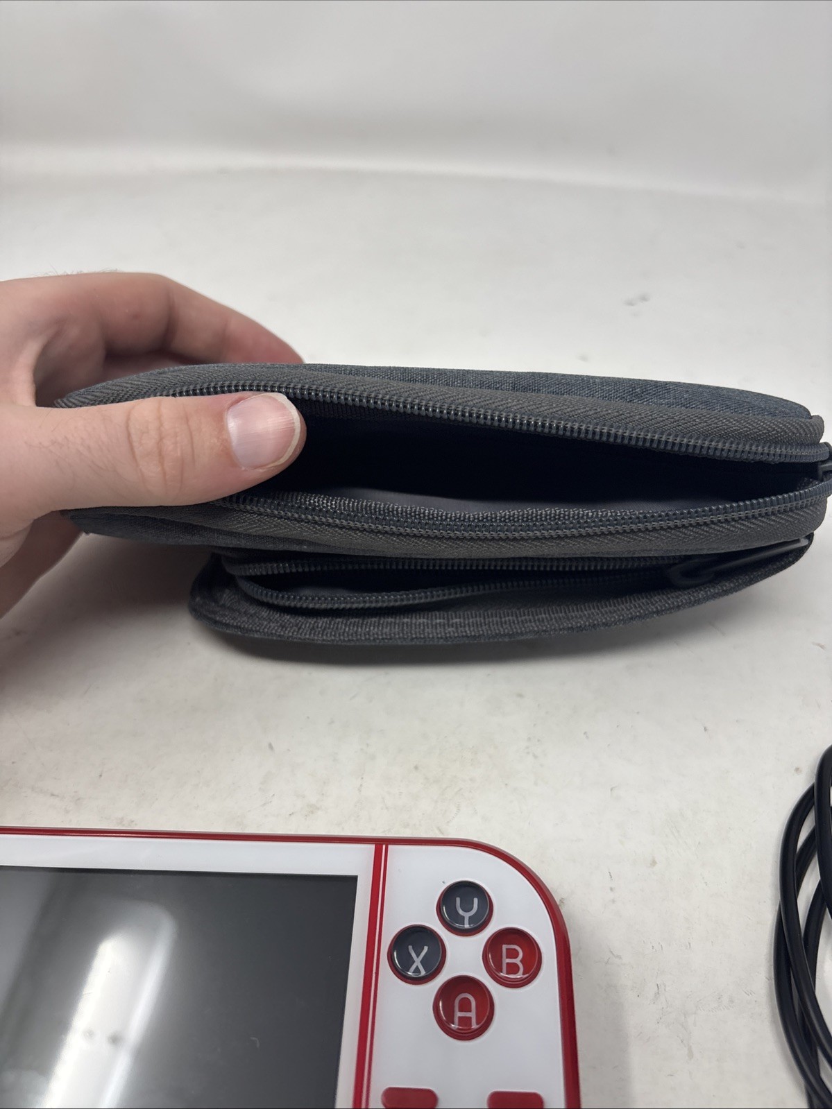 Blaze Evercade Handheld Console with Carrying Case And Cord Red White. Read