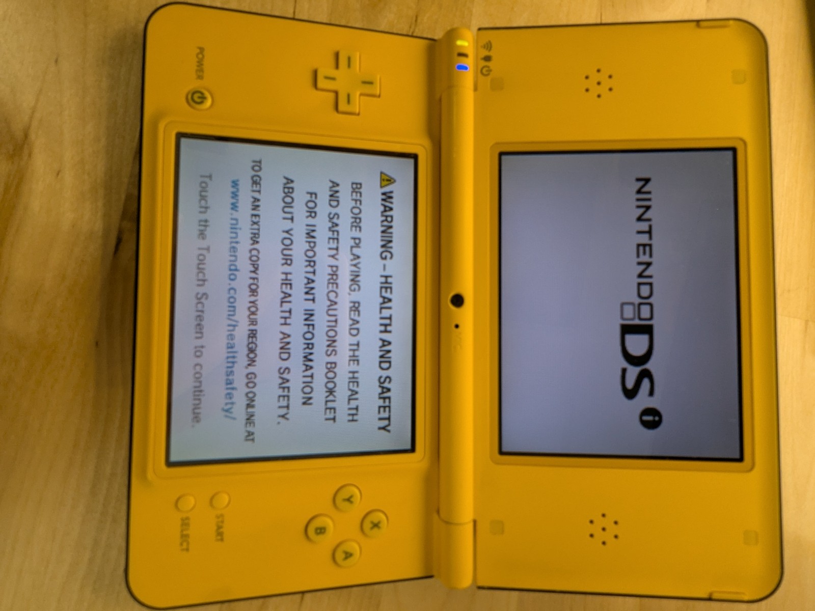 Nintendo DSi LL Yellow Handheld Console With AC Adapter – working minor damage