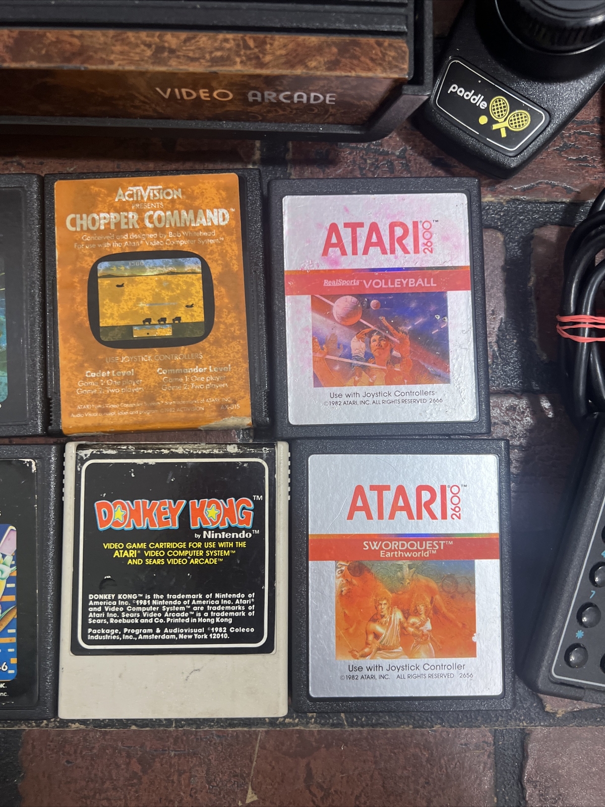 ATARI 2600 4-Switch w/ Power Supply, Joysticks, Paddles, TV Adapter & 7 Games