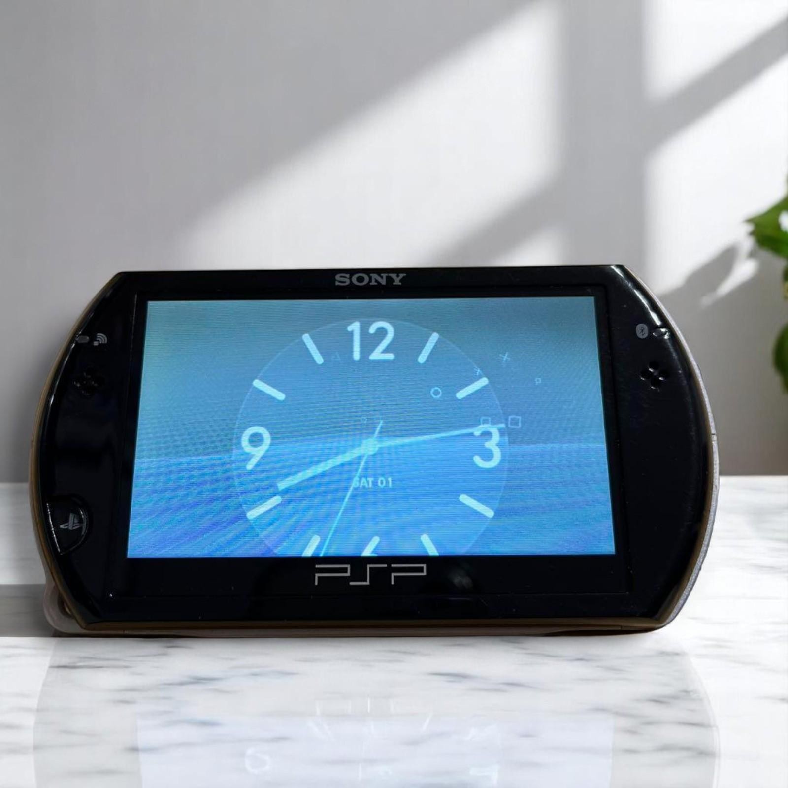 Sony PlayStation Portable Go Piano Black PSP-N1000 Console Only USED
