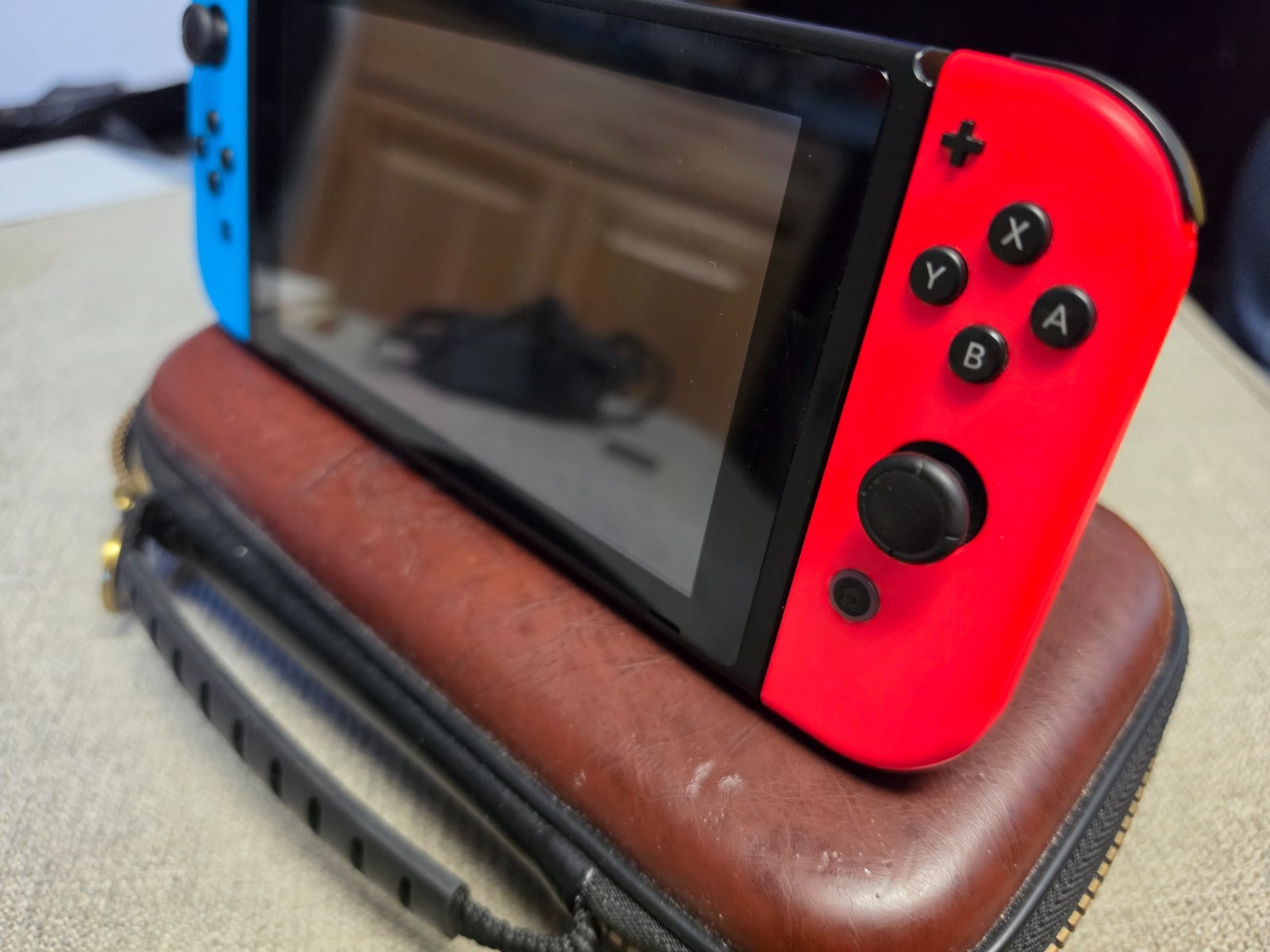 Nintendo Switch 32GB Handheld Console – Red/Blue Scarlet/Violet Brown BOTW case.