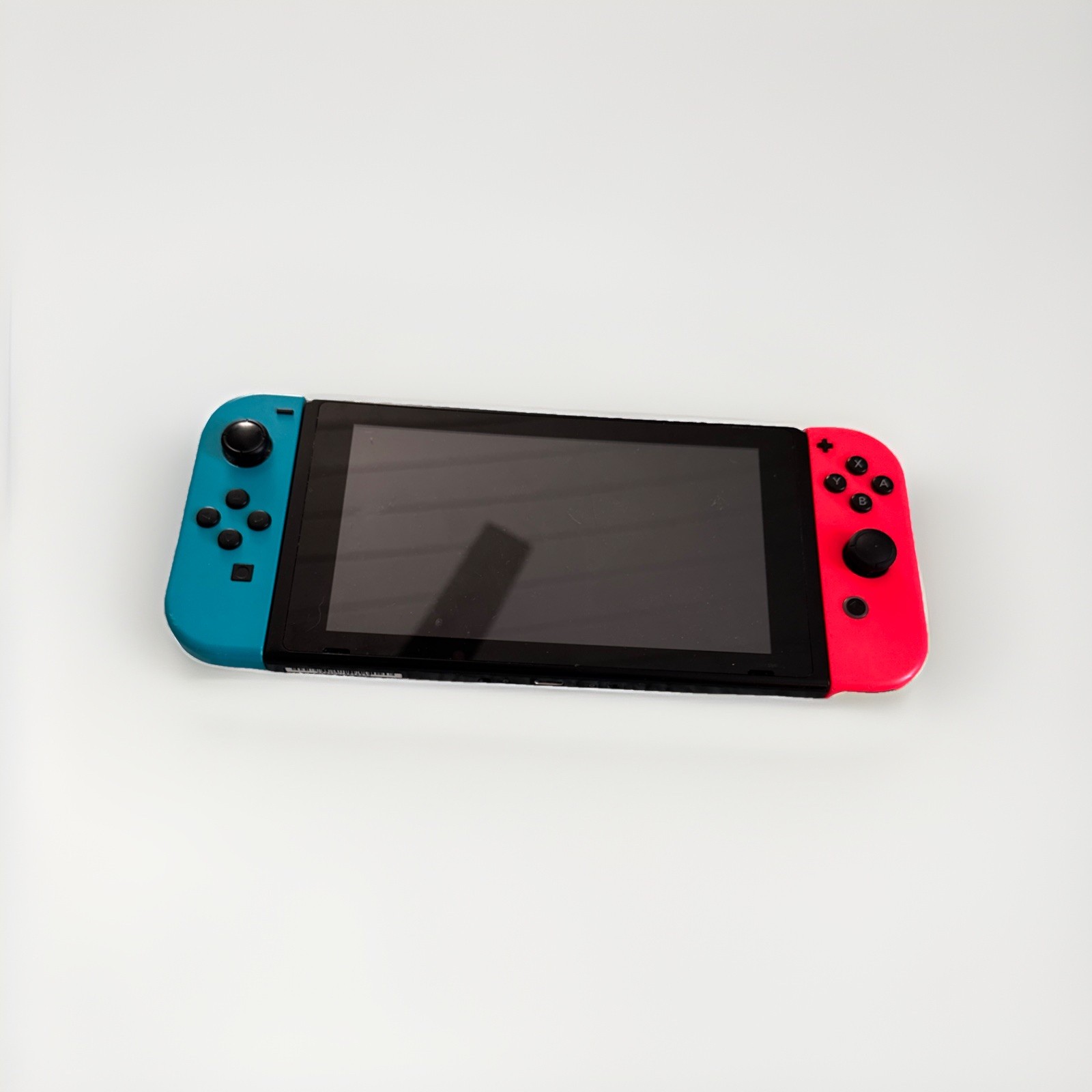 Nintendo Switch Gray Console with Neon Red and Neon Blue Joy-Con