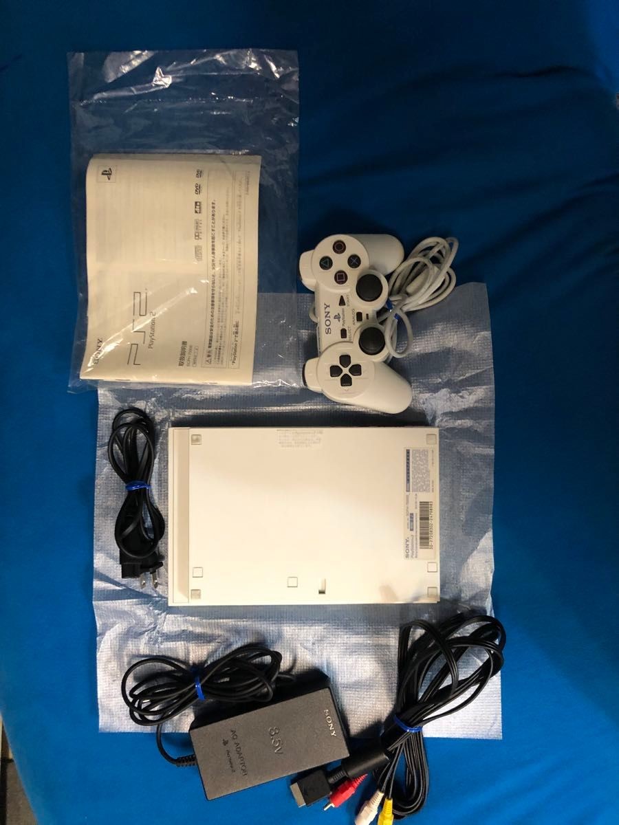 Excellent condition, manual unopened, working condition, PS2 SCPH-75000 white,
