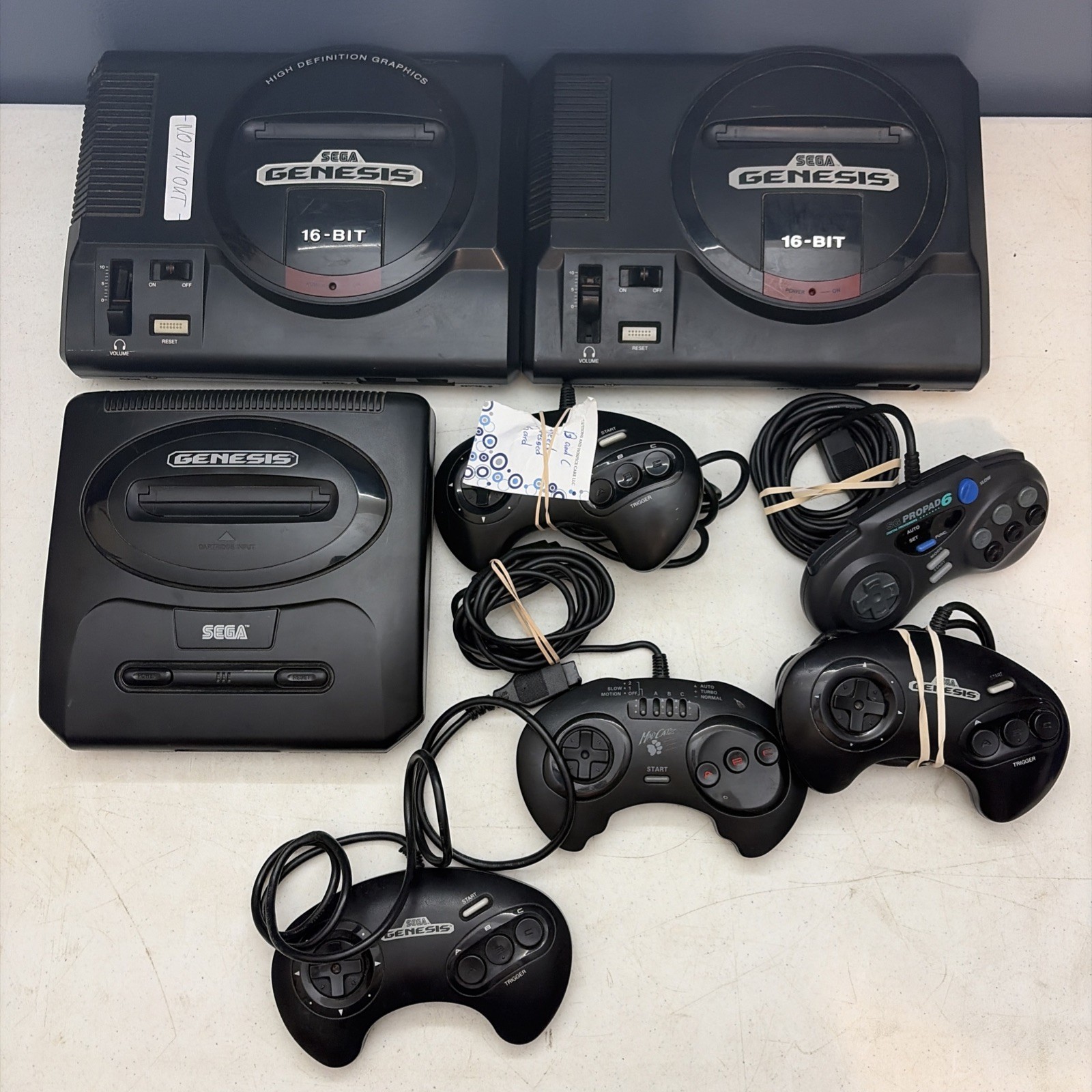 Lot of 2 Sega Genesis console For Parts Repair Replace Model 1 2 + Controllers