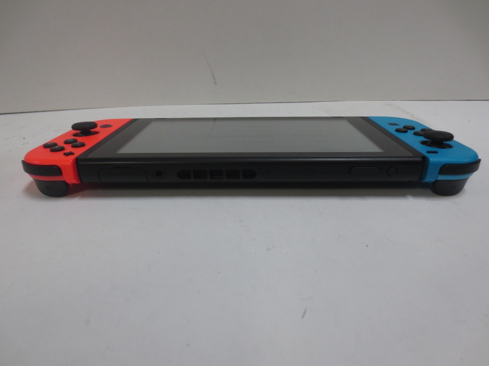 Nintendo Switch Console HAC-001(-01) w/ Neon Red and Blue Joycons