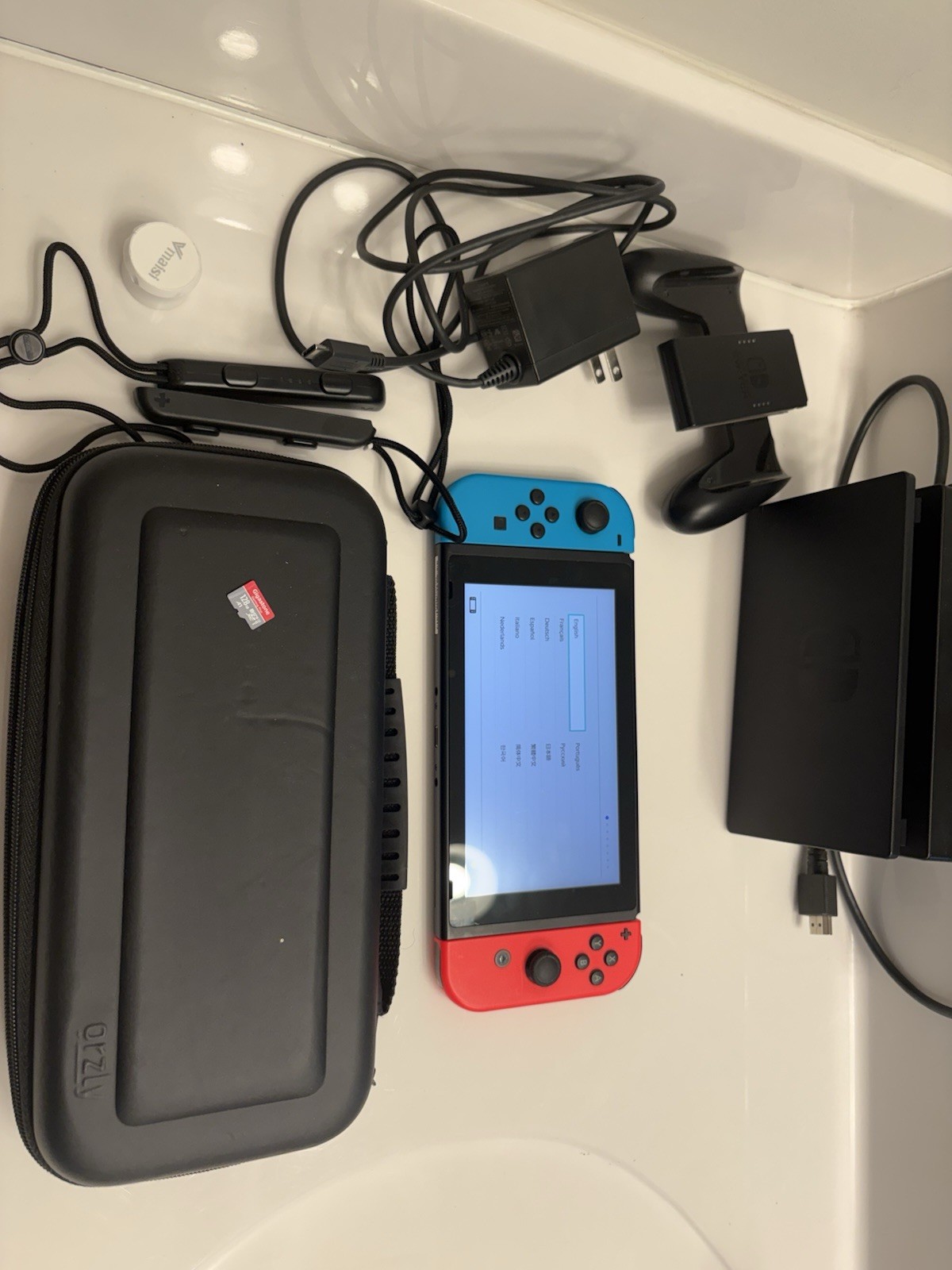 Nintendo Switch HAC-001 console w/ dock, 128gb SD card, joycons, cords, and case