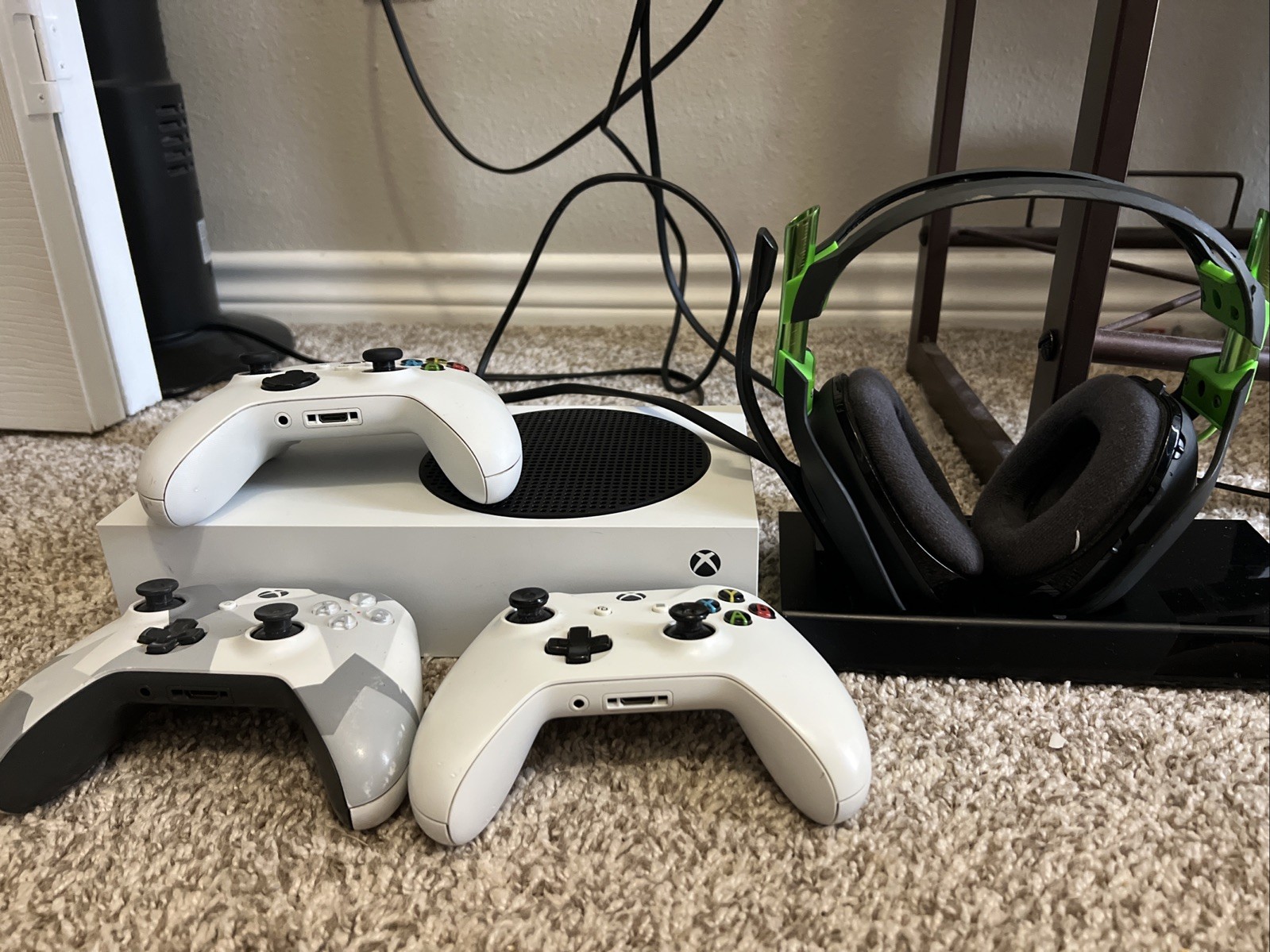 Xbox Series S with multiple games a headset and 3 remotes all in great condition