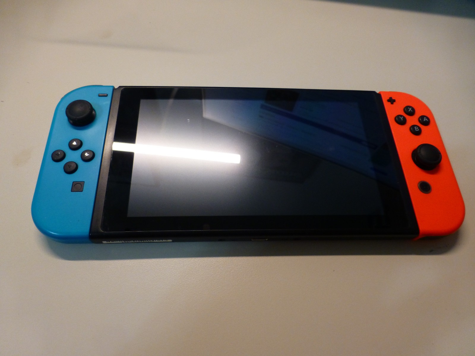 Nintendo Switch Console HAC-001 – 32GB 720p – Neon Red/Neon Blue