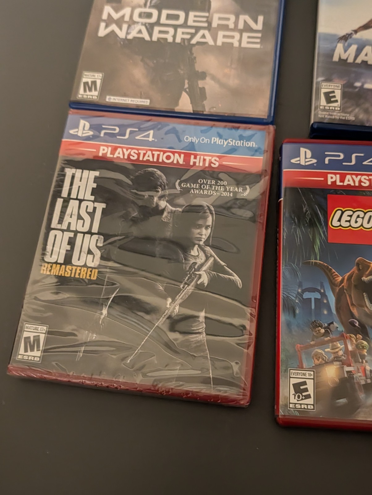 Sony PlayStation 4 Home Console Bundle, Controllers, Cords, 4 Games CUH-1215A