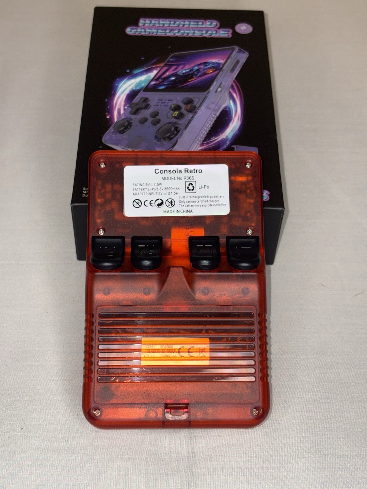 R36S Handheld Game Console Transparent Red Dual Joystick Wi-Fi Bluetooth