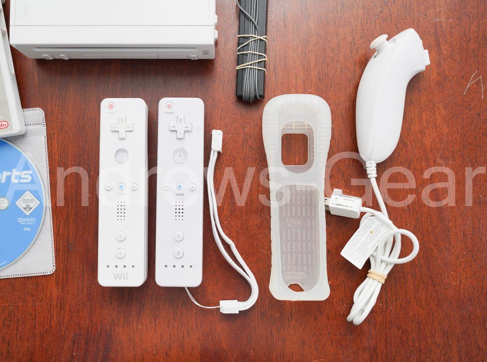 Nintendo Wii White Console Bundle – 2 Remotes, Nunchuk, Sensor Bar & 3 Games